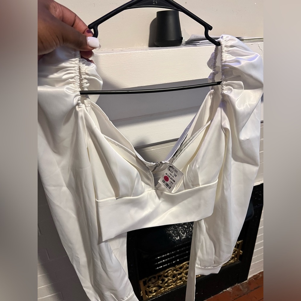 Large cropped corset blouse . Sooo cute and dainty , off white color
